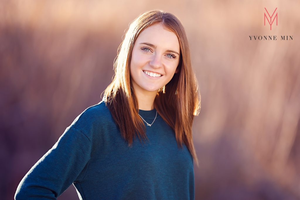 A portrait of a teen girl during family photos with Yvonne Min Photography.