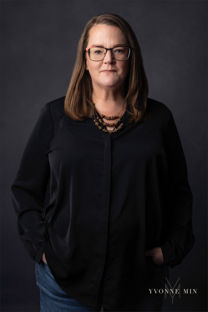A photograph of a woman taken by Yvonne Min Photography for a woman who supports the local arts in Denver, Colorado.