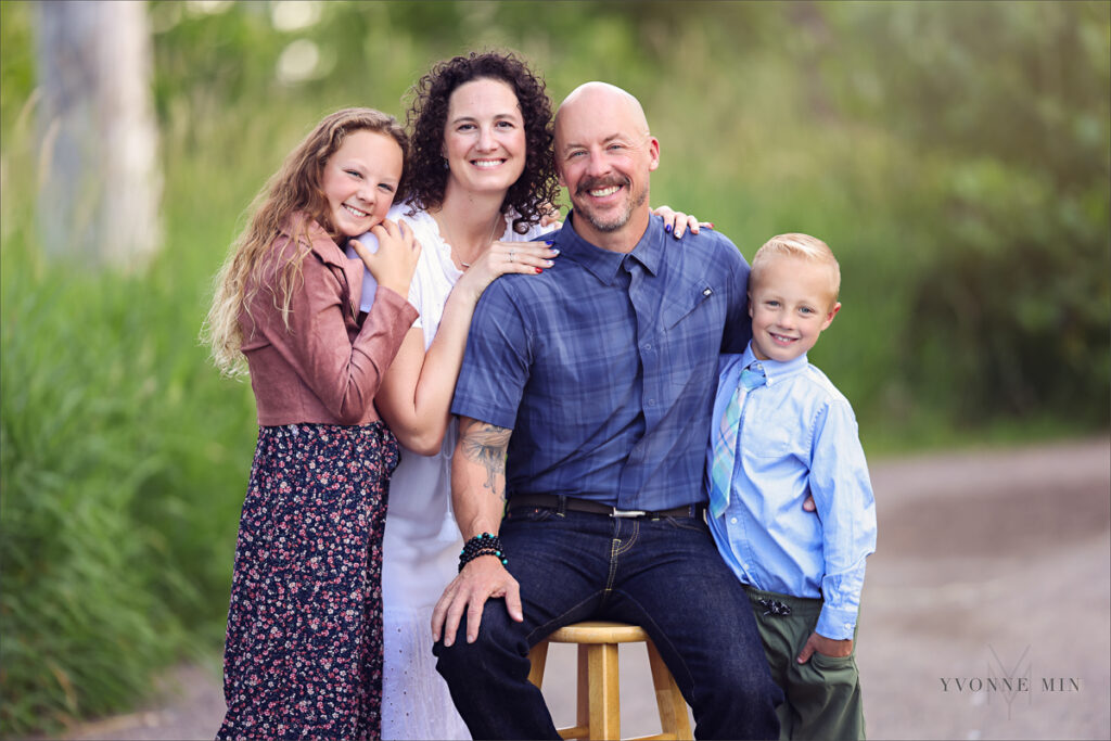 A family photograph taken at McKay Lake in Westminster, Colorado by Yvonne Min Photography.