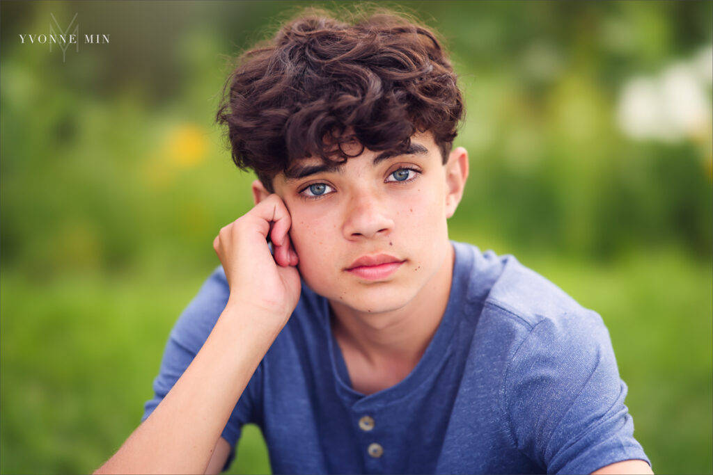 A close-up portrait of a teenage boy taken in Purple Park, Superior, Colorado by Yvonne Min Photography.